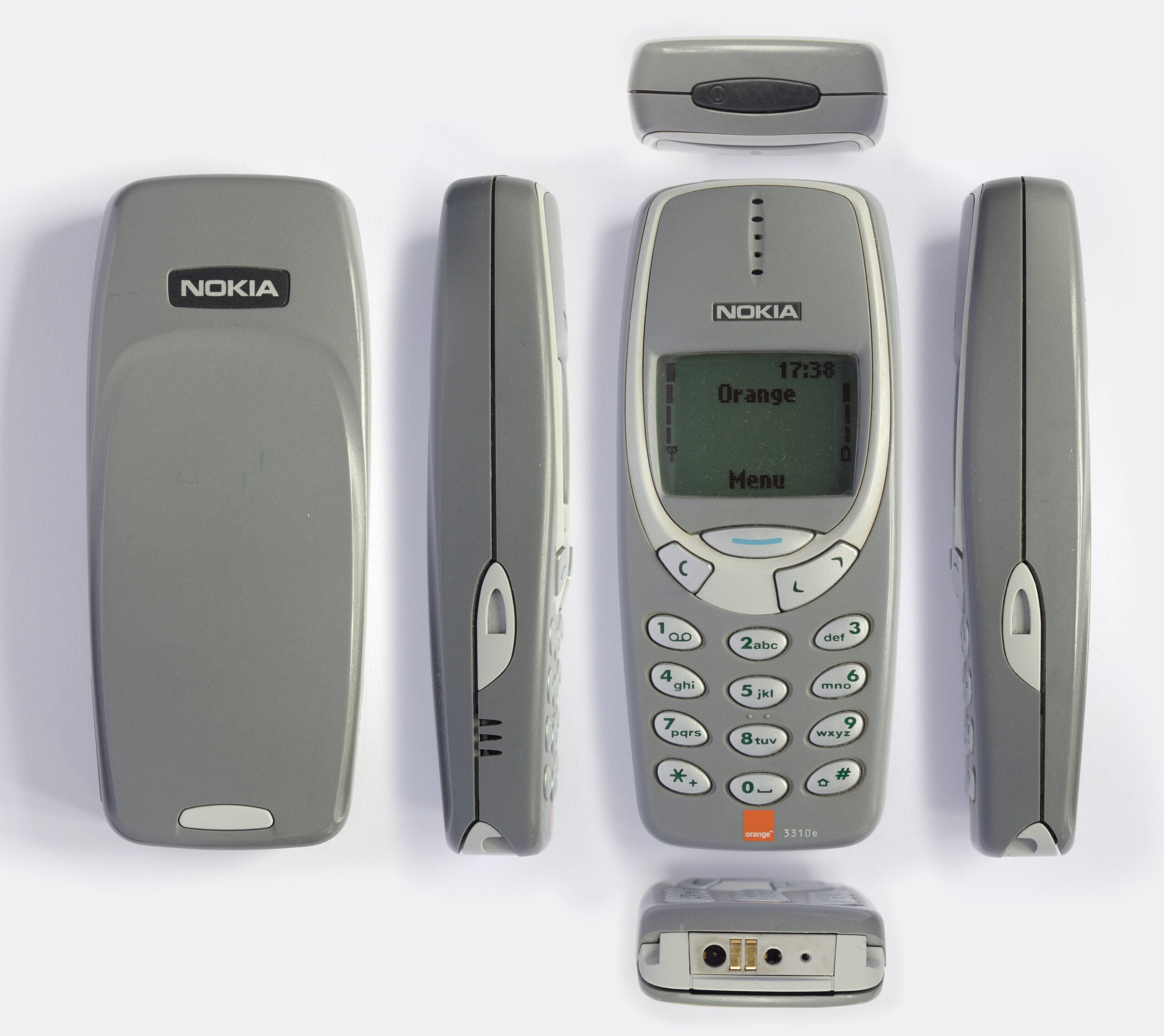 Five views of a classic Nokia 3310 mobile phone in gray: back, left side, front, right side, and bottom, showing buttons, screen, and ports, arranged on a white background.