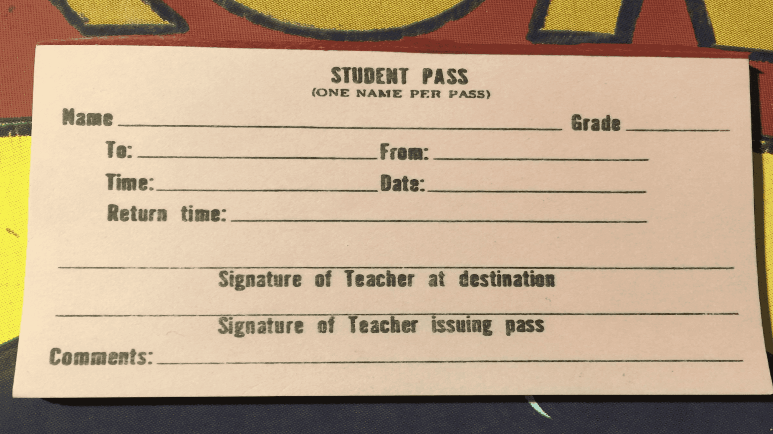 A blank student pass form with spaces to fill in name, grade, to/from, time, date, return time, teacher signatures, and comments.