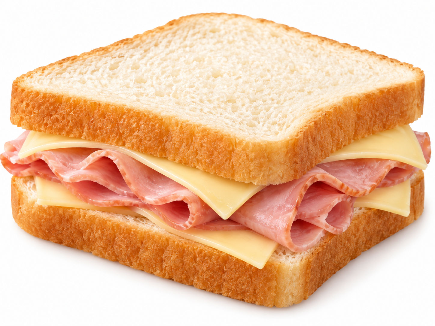 A ham and cheese sandwich on white bread.