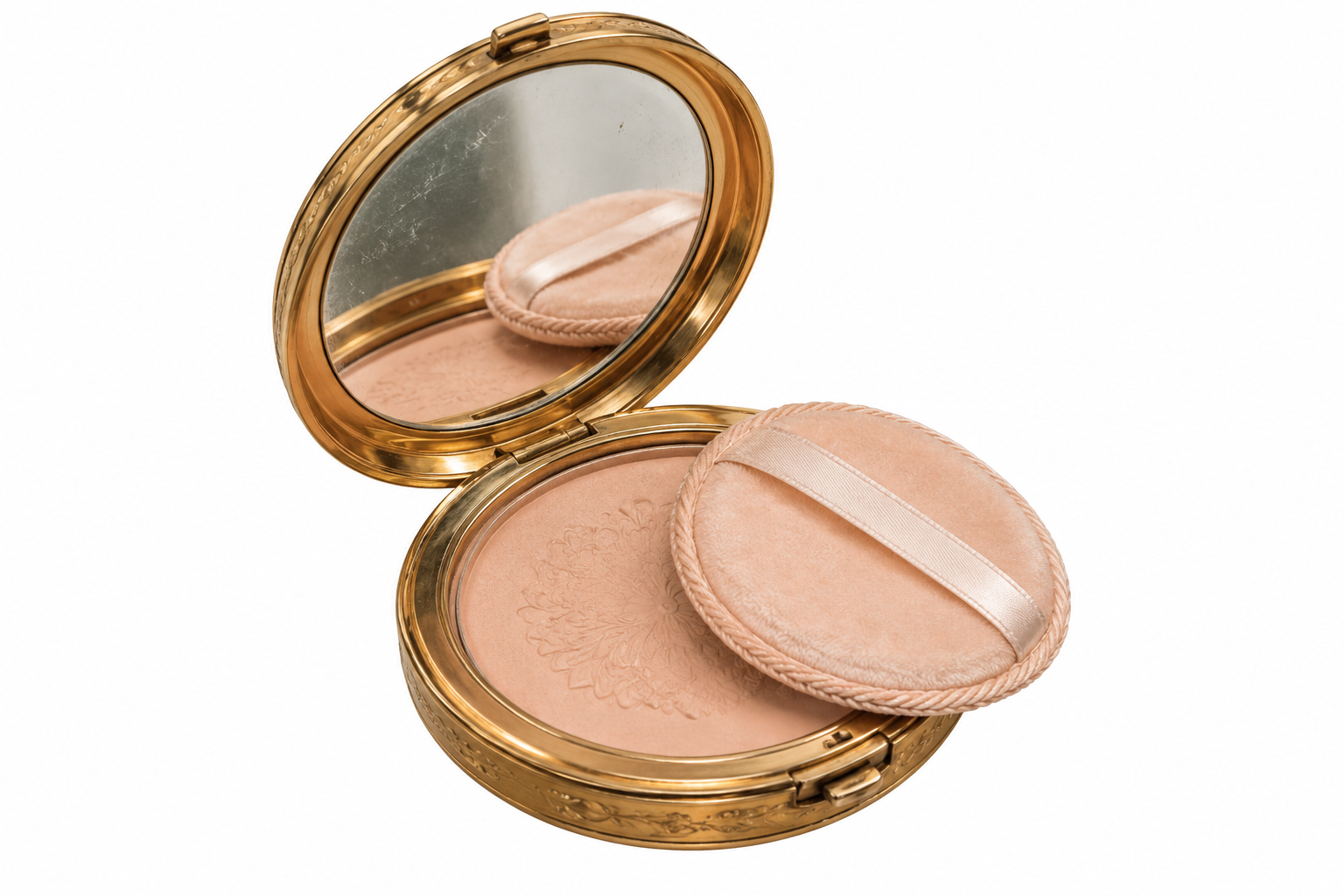 An open gold compact with a mirror, a round pan of pressed powder, and a soft applicator puff.