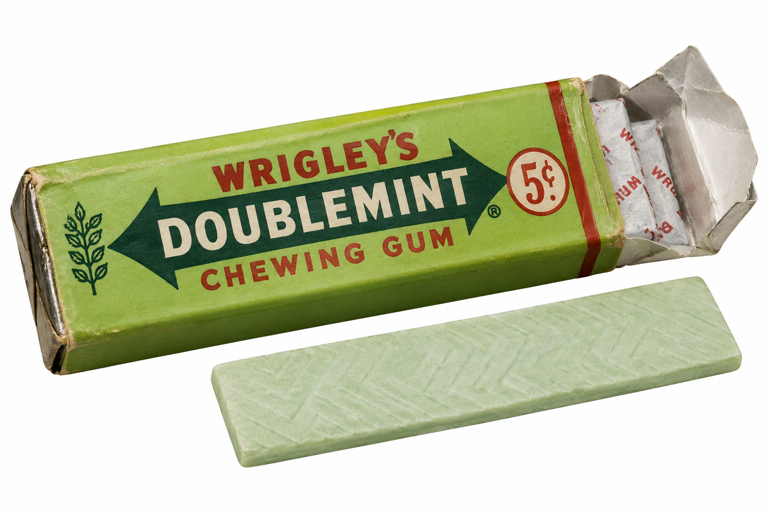 A pack of Wrigley’s Doublemint chewing gum with one unwrapped stick of gum lying in front.