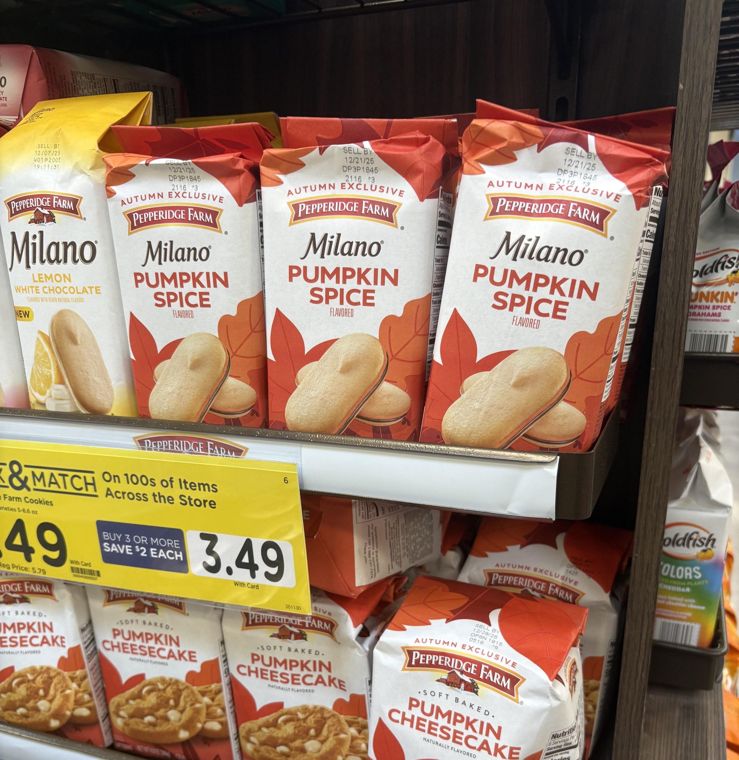 Shelves stocked with Pepperidge Farm Milano cookies, featuring Lemon, Pumpkin Spice, and Pumpkin Cheesecake flavors, with a yellow price tag for a “Mix & Match” sale.