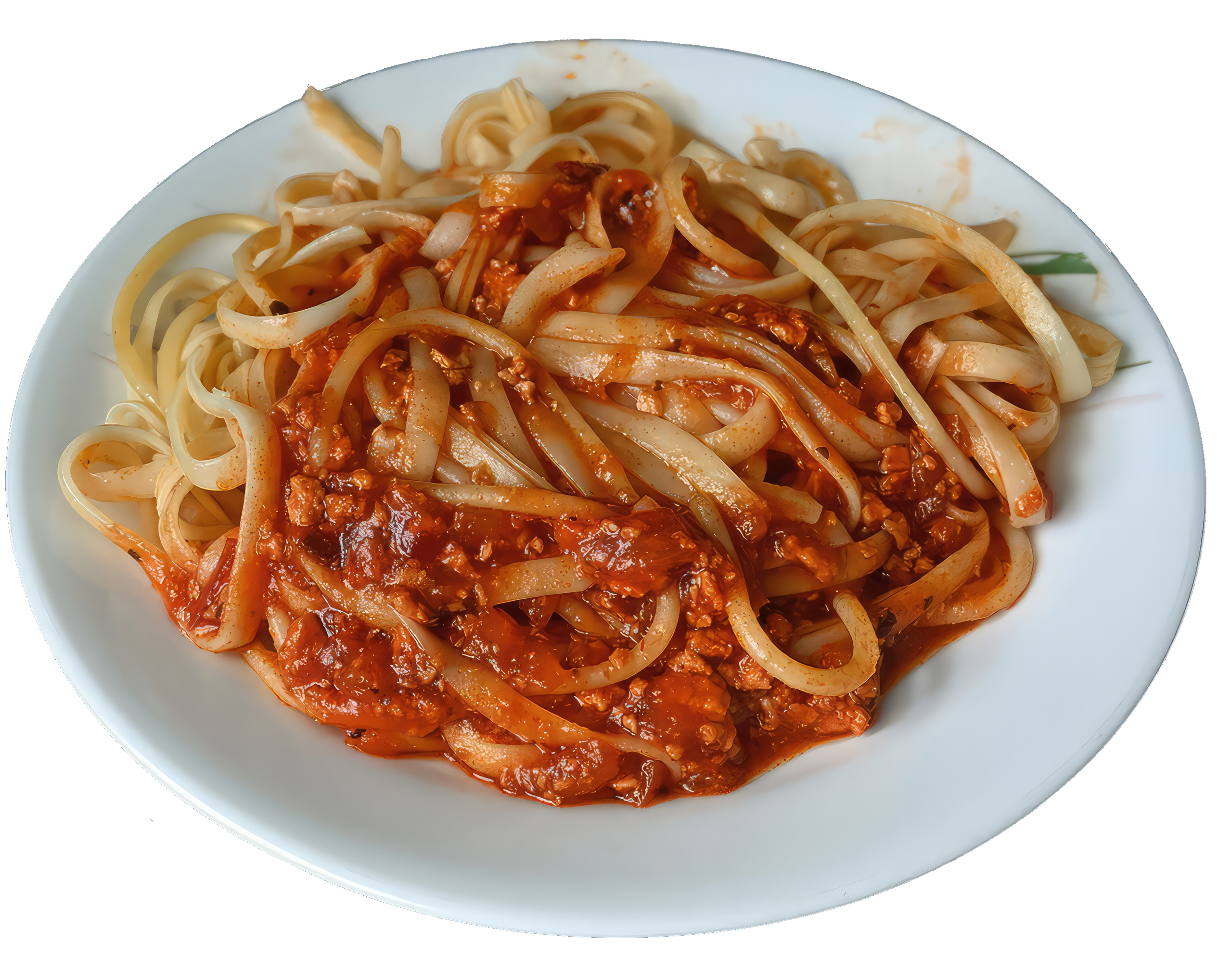 A plate of linguine topped with a thick meat and tomato sauce.