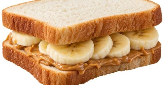 A peanut butter and banana sandwich on white bread.