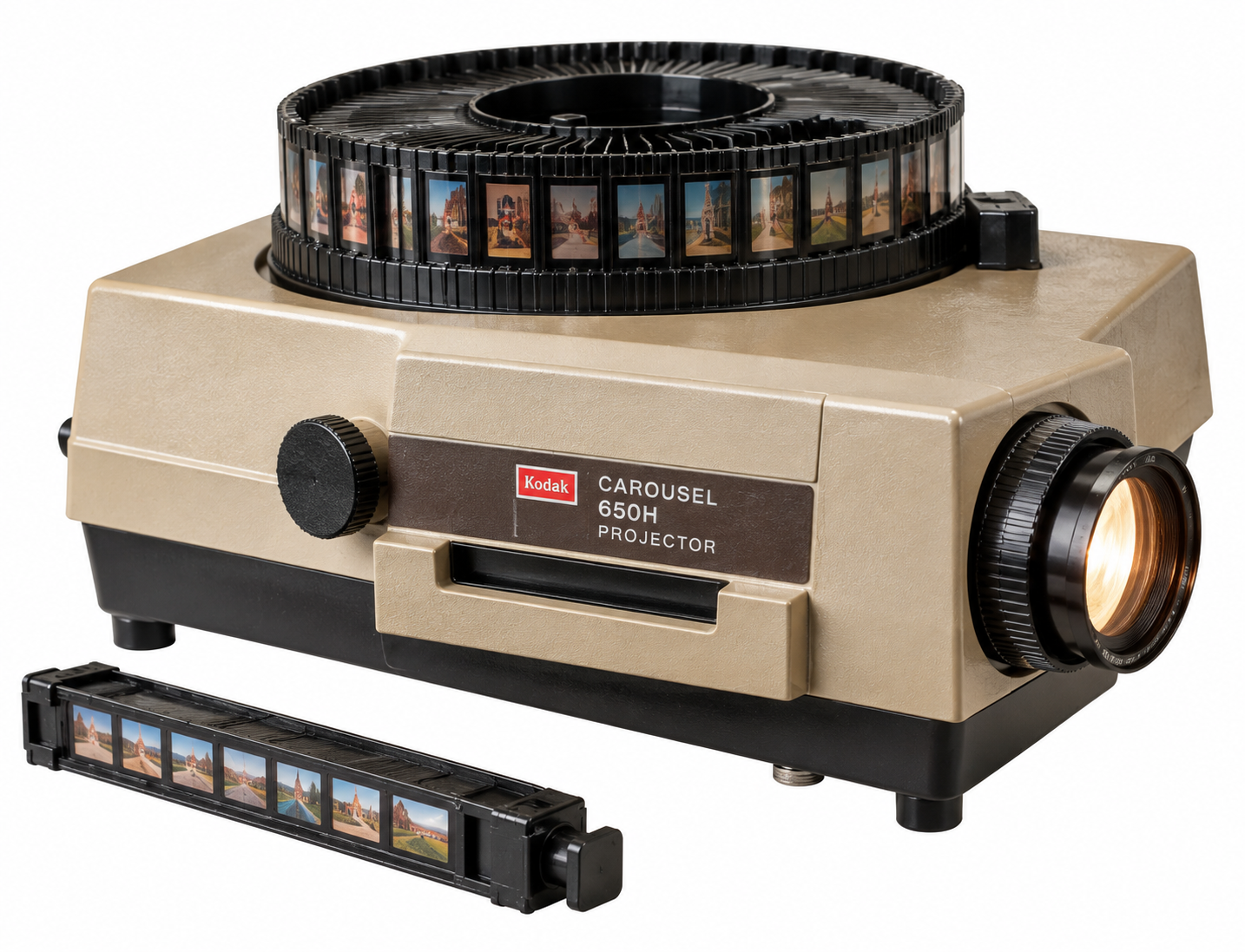 A beige Kodak Carousel 650H slide projector with a circular tray of mounted slides on top and a separate strip of film slides in the foreground.