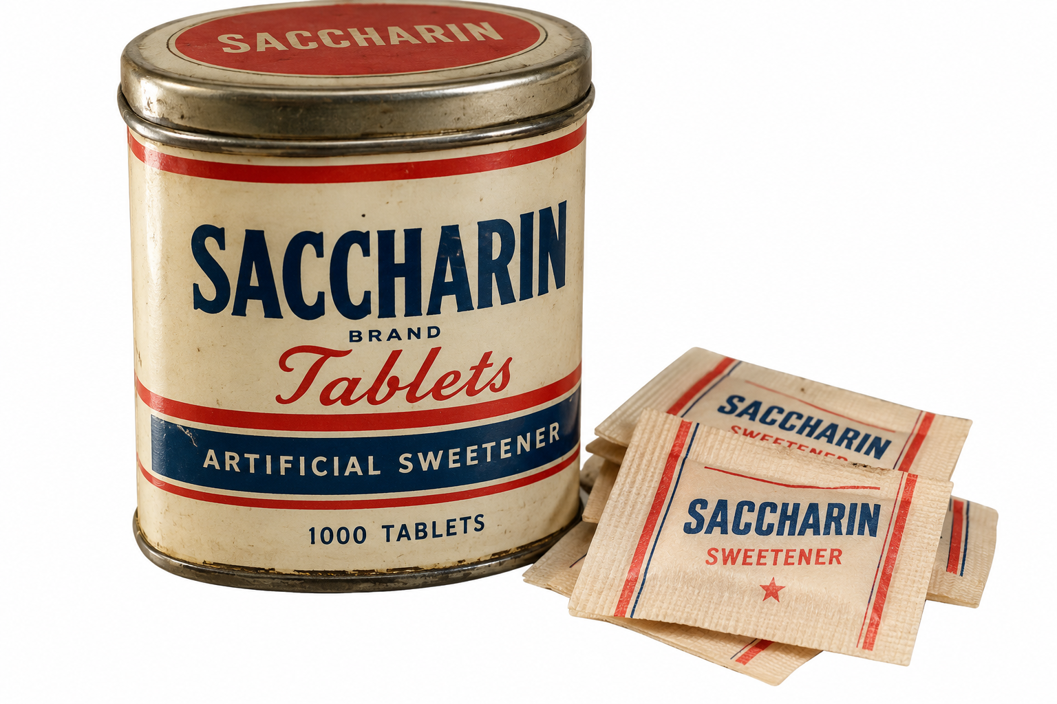 A vintage metal tin of saccharin tablets next to several individual paper packets of saccharin sweetener.
