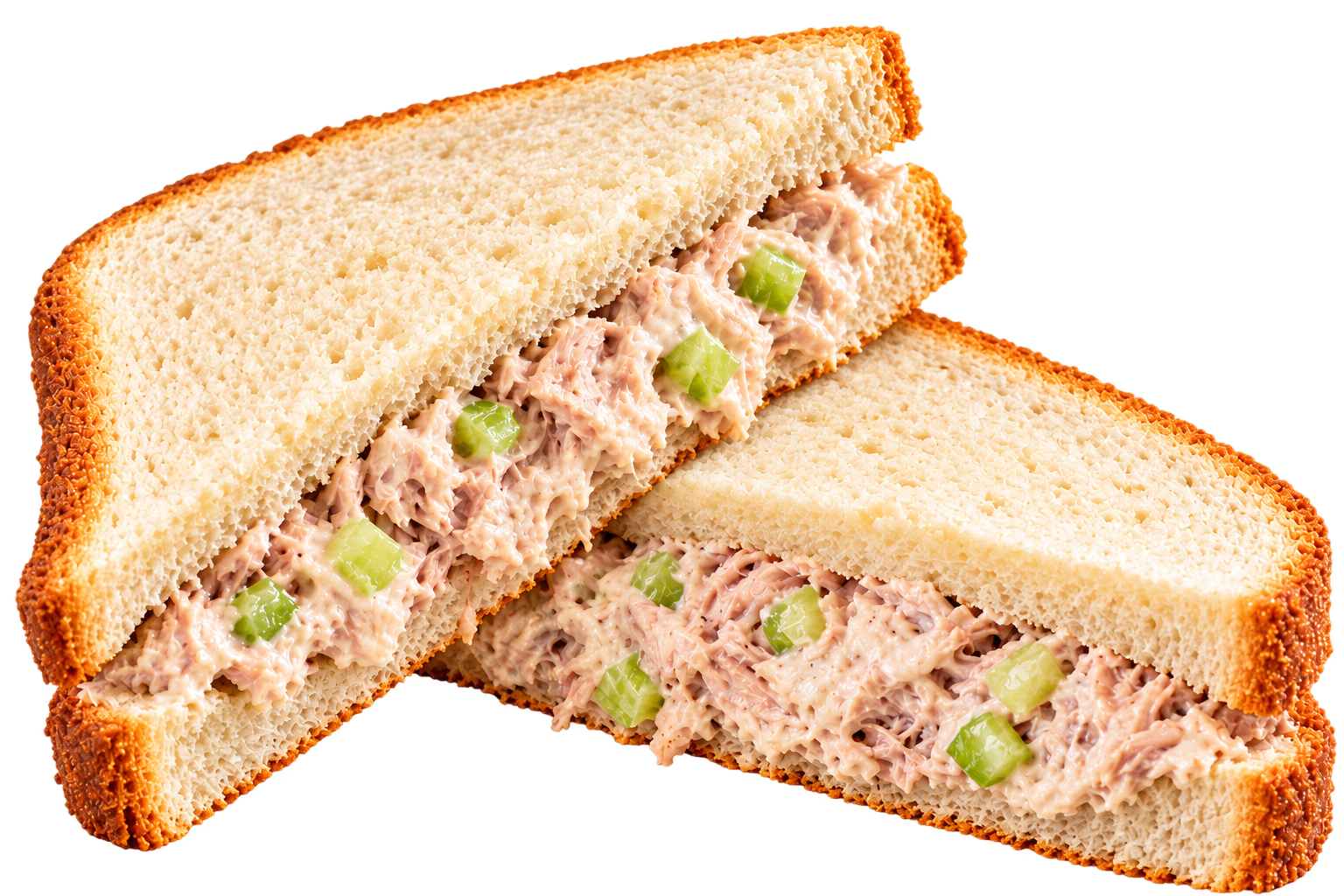 A tuna salad sandwich cut in half on white bread with visible chunks of celery.
