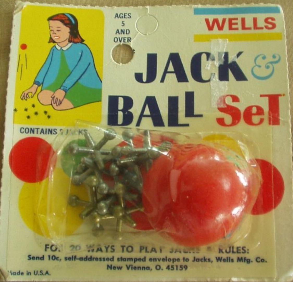 Vintage Wells Jack & Ball Set toy in original packaging featuring a cartoon girl playing jacks and a red ball.