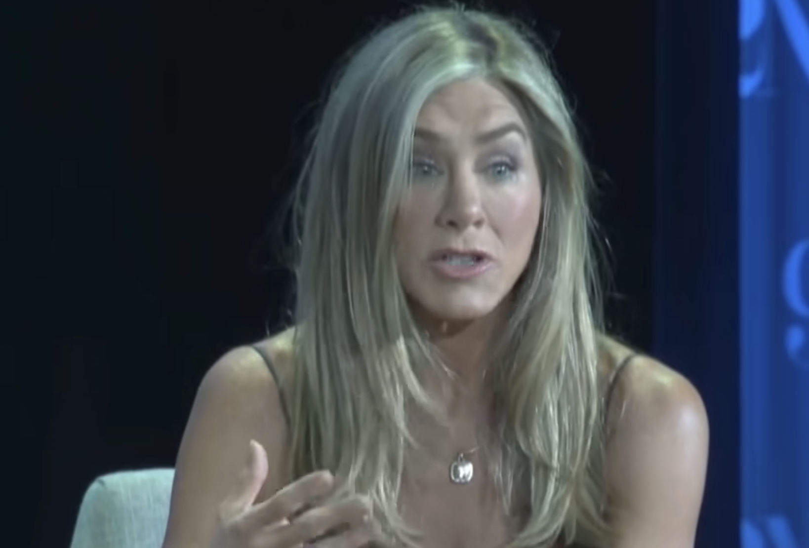 Jennifer Aniston speaking during an interview.