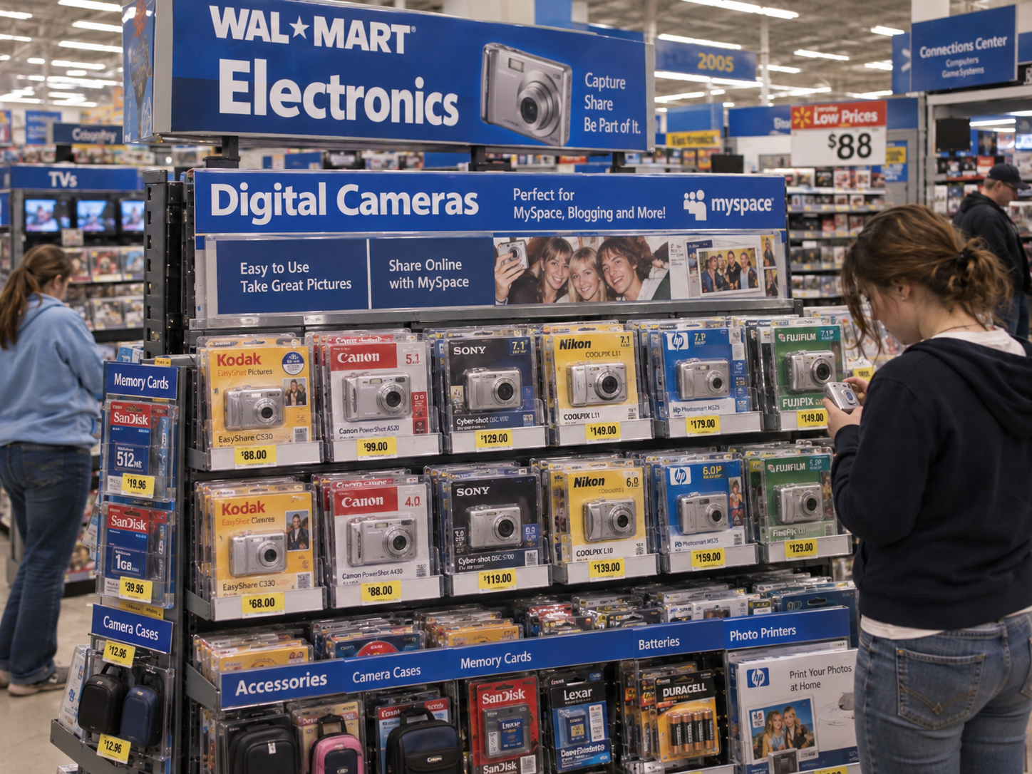 A Walmart electronics aisle display featuring a variety of digital cameras for sale, with a young woman standing in the foreground looking at a camera.