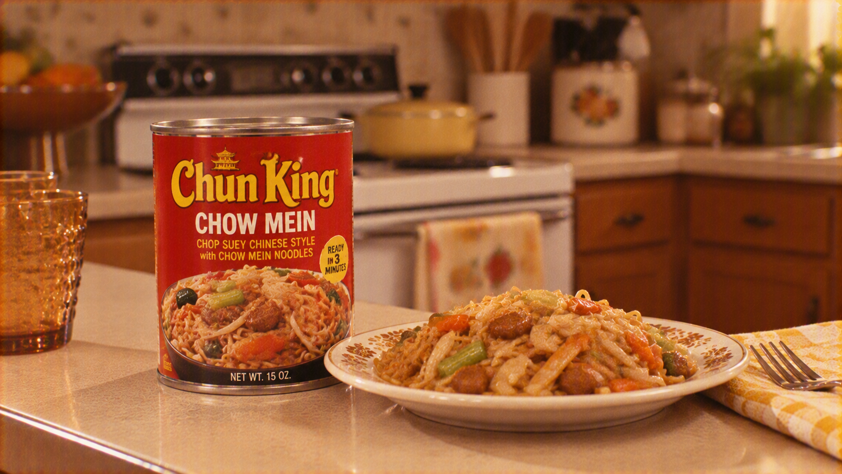 A can of Chun King chow mein sits on a kitchen counter next to a plate of the prepared food.