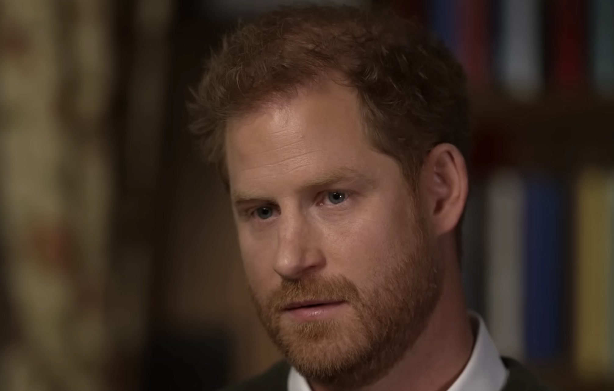 Prince Harry looking toward the camera.