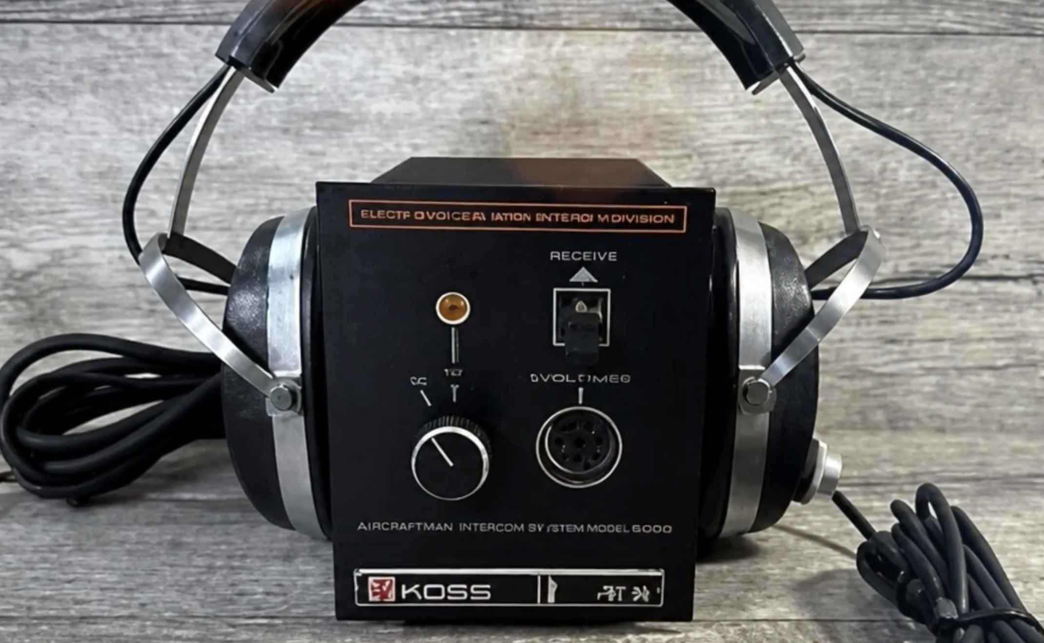 Electro-Voice Aircraftman Intercom System Model 6000 unit with an attached headset.